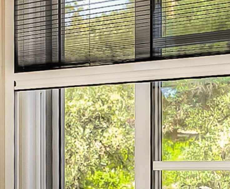 Close up of Gioconda mosquito screen in a bedroom window.